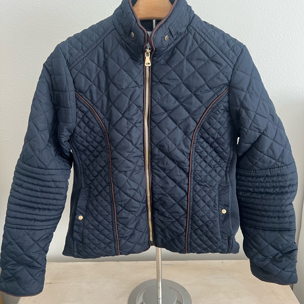 Royalty for Me Quilted Navy Moto Jacket with brown piping and faux fur lining.